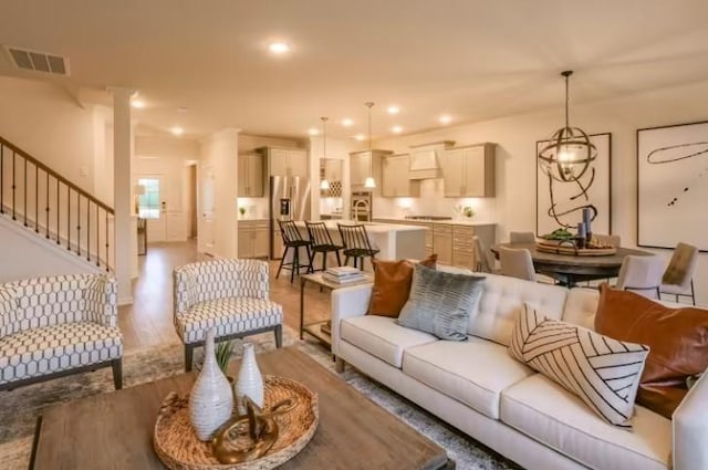 3388 Tucker Trce, Columbia, TN 38401 - living area with stairs and light wood-style flooring