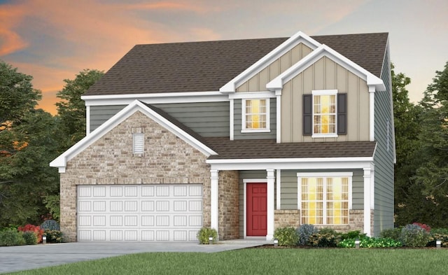 3388 Tucker Trce, Columbia, TN 38401 - view of front of home with stone siding, board and batten siding, a shingled roof, and driveway