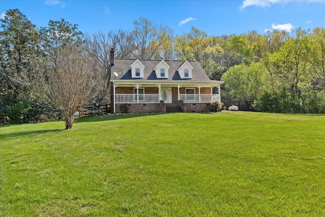 3035 Culleoka Hwy, Culleoka, TN 38451 - cape cod home featuring brick siding, covered porch, a front lawn, and a chimney