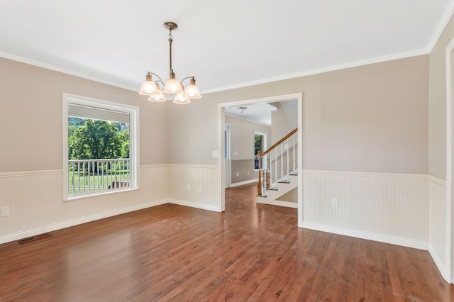 3035 Culleoka Hwy, Culleoka, TN 38451 - unfurnished room with a chandelier, a wainscoted wall, wood finished floors, stairway, and ornamental molding