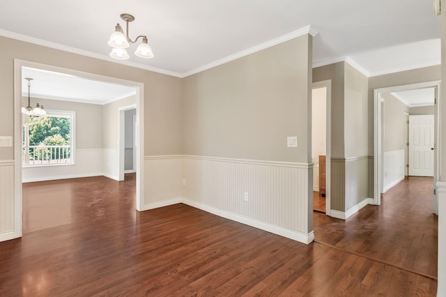 3035 Culleoka Hwy, Culleoka, TN 38451 - spare room with a chandelier, dark wood finished floors, a wainscoted wall, and ornamental molding