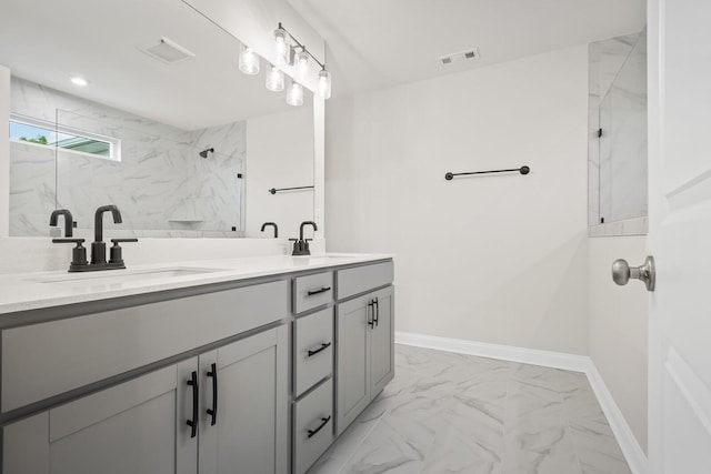 1922 Hildebrand Ln, Columbia, TN 38401 - full bathroom with double vanity, marble finish flooring, and a marble finish shower