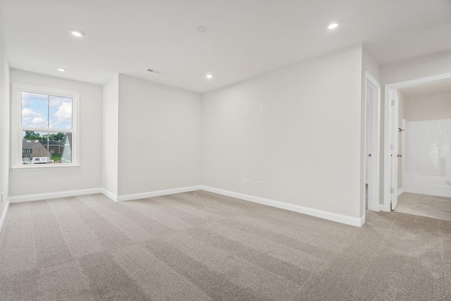 1922 Hildebrand Ln, Columbia, TN 38401 - carpeted empty room with recessed lighting