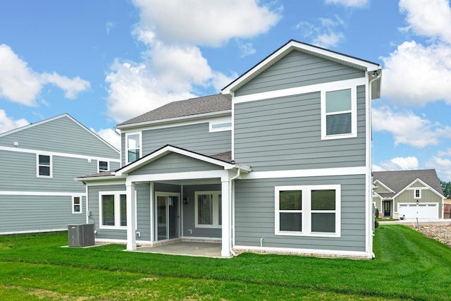 1922 Hildebrand Ln, Columbia, TN 38401 - rear view of property featuring a lawn and a patio area
