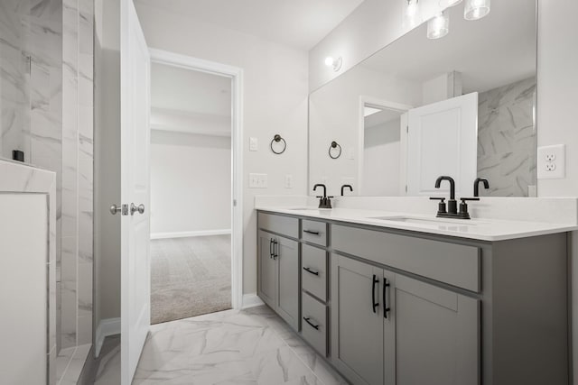 1922 Hildebrand Ln, Columbia, TN 38401 - full bathroom featuring marble look tile flooring, double vanity, and a marble finish shower