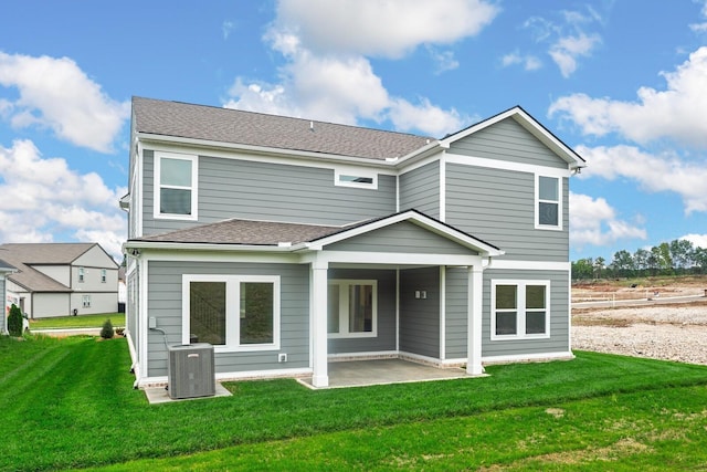 1922 Hildebrand Ln, Columbia, TN 38401 - rear view of house featuring a patio area, a yard, and a shingled roof