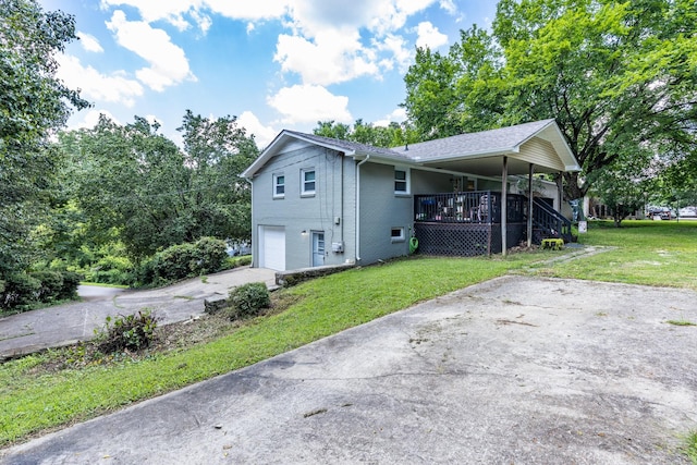 528 Maple St, Pulaski, TN 38478 - view of home's exterior with driveway, covered porch, a yard, and an attached garage
