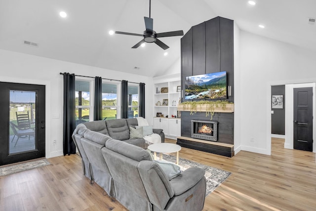 426 Maple Bend Rd, Winchester, TN 37398 - living room with high vaulted ceiling, ceiling fan, a fireplace, light wood-style flooring, and recessed lighting