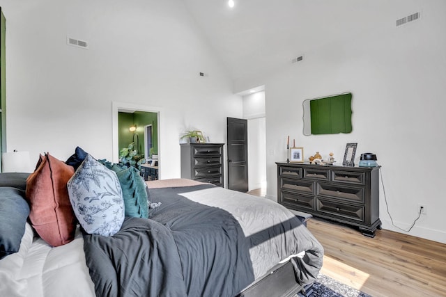 426 Maple Bend Rd, Winchester, TN 37398 - bedroom featuring high vaulted ceiling, light wood finished floors, recessed lighting, and ensuite bathroom