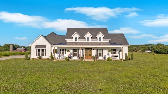 426 Maple Bend Rd, Winchester, TN 37398 - view of front of house featuring covered porch, a front yard, french doors, and a metal roof