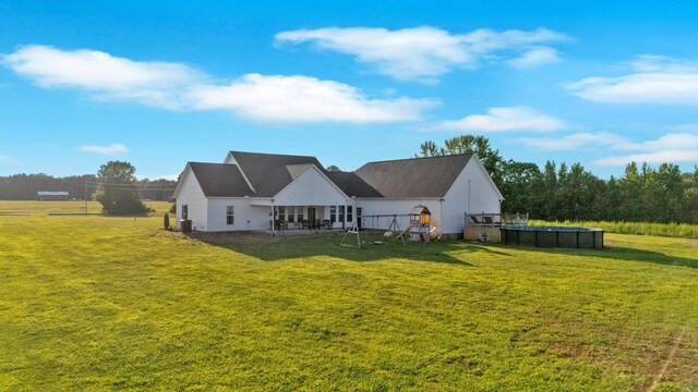 426 Maple Bend Rd, Winchester, TN 37398 - back of property with a lawn and an outdoor pool