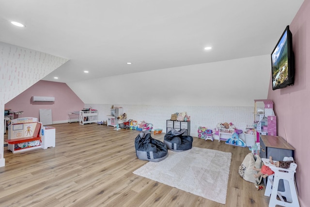 426 Maple Bend Rd, Winchester, TN 37398 - game room featuring a wall unit AC, wood finished floors, vaulted ceiling, and recessed lighting