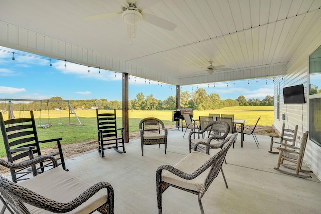 426 Maple Bend Rd, Winchester, TN 37398 - view of patio / terrace featuring a ceiling fan and a playground