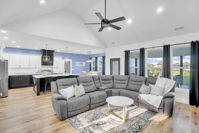 426 Maple Bend Rd, Winchester, TN 37398 - living room featuring recessed lighting, light wood-style floors, ceiling fan, and high vaulted ceiling