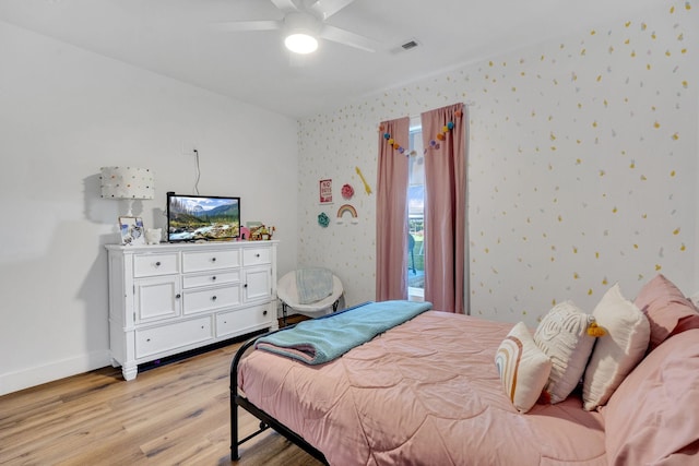 426 Maple Bend Rd, Winchester, TN 37398 - bedroom featuring light wood-type flooring, wallpapered walls, and a ceiling fan