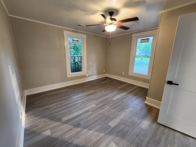 810 Lynwood St, Winchester, TN 37398 - empty room featuring healthy amount of natural light, dark wood-style floors, ornamental molding, and ceiling fan