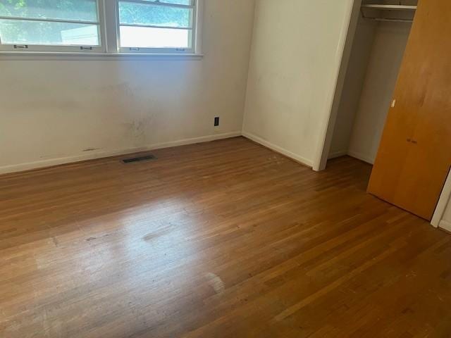 320 Shepherd Hills Dr, Madison, TN 37115 - unfurnished bedroom featuring wood finished floors and a closet