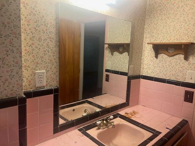 320 Shepherd Hills Dr, Madison, TN 37115 - bathroom featuring wallpapered walls, a wainscoted wall, and vanity