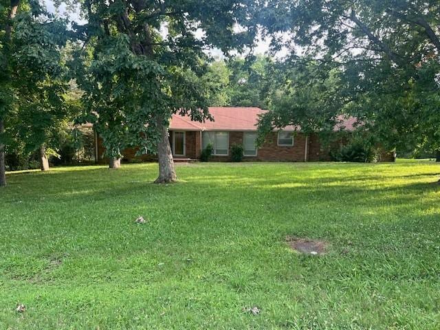 320 Shepherd Hills Dr, Madison, TN 37115 - view of front of house with a front yard