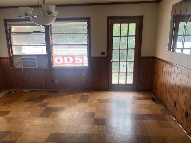 320 Shepherd Hills Dr, Madison, TN 37115 - unfurnished dining area with a wainscoted wall, plenty of natural light, a chandelier, light flooring, and wooden walls