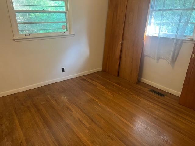 320 Shepherd Hills Dr, Madison, TN 37115 - spare room featuring wood finished floors and baseboards