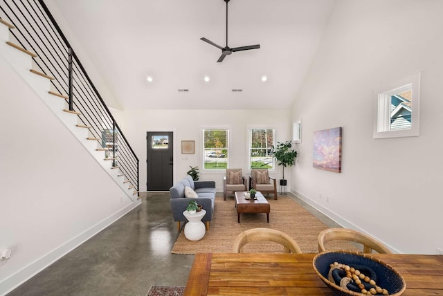 1823 River Dr, Nashville, TN 37218 - living area featuring high vaulted ceiling, concrete flooring, a ceiling fan, stairway, and recessed lighting