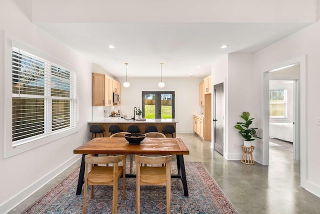 1823 River Dr, Nashville, TN 37218 - dining area with french doors, finished concrete floors, and recessed lighting