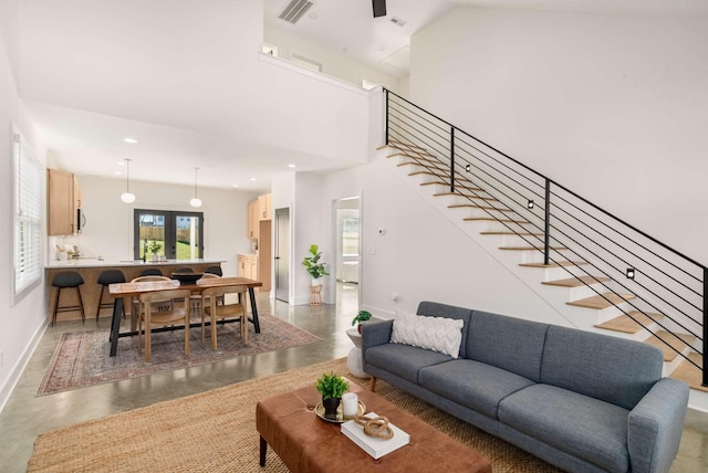 1823 River Dr, Nashville, TN 37218 - living area featuring stairs, concrete floors, and recessed lighting