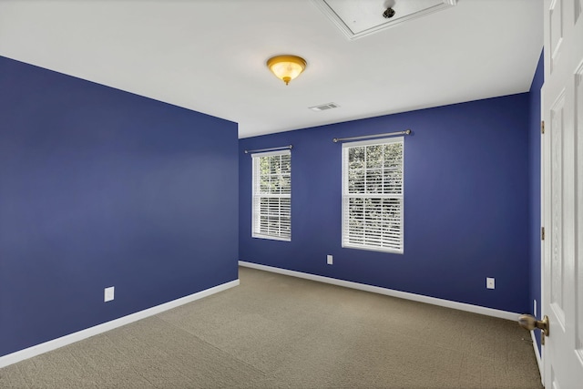 2008 Kingston Pl, Spring Hill, TN 37174 - spare room featuring carpet floors and attic access