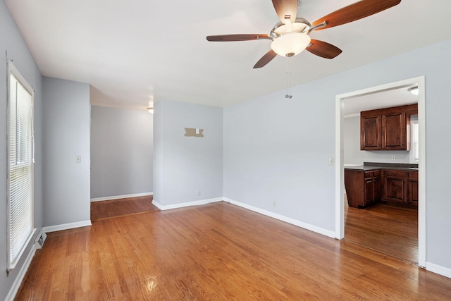 2311 Mayfair Ave, Murfreesboro, TN 37130 - empty room with wood finished floors and ceiling fan