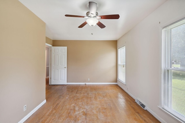 2311 Mayfair Ave, Murfreesboro, TN 37130 - spare room featuring light wood-style floors, healthy amount of natural light, and ceiling fan