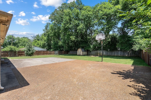 2311 Mayfair Ave, Murfreesboro, TN 37130 - fenced backyard featuring a storage unit and a patio area