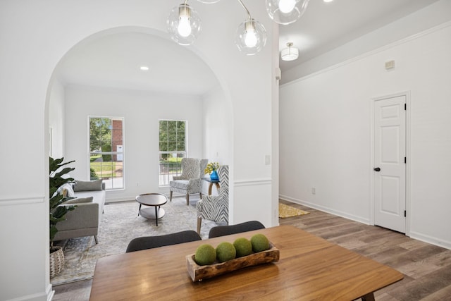 201 Hideaway Trl, Franklin, TN 37069 - dining room with arched walkways and wood finished floors