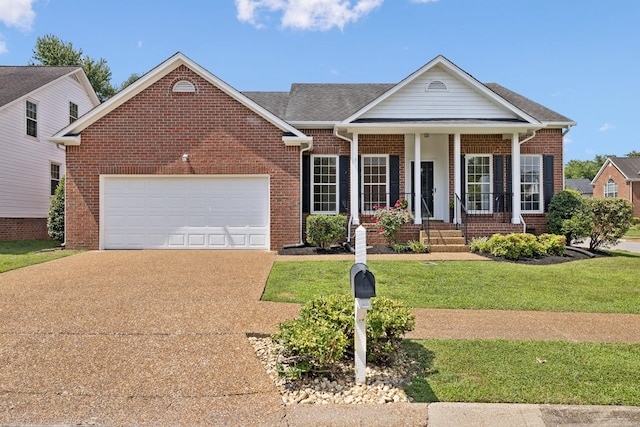201 Hideaway Trl, Franklin, TN 37069 - view of front of property featuring brick siding, an attached garage, concrete driveway, a front yard, and covered porch