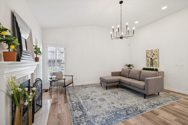 201 Hideaway Trl, Franklin, TN 37069 - living room featuring a chandelier, light wood finished floors, recessed lighting, and a premium fireplace