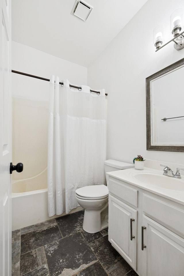201 Hideaway Trl, Franklin, TN 37069 - bathroom featuring vanity, stone finish floors, and shower / bathtub combination with curtain