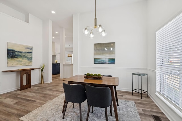 201 Hideaway Trl, Franklin, TN 37069 - dining space with wood finished floors, a chandelier, and recessed lighting