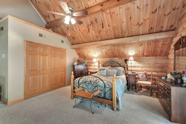 20151 Ben Fly Rd, Lyles, TN 37098 - bedroom with wood ceiling, carpet, a closet, log walls, and a ceiling fan