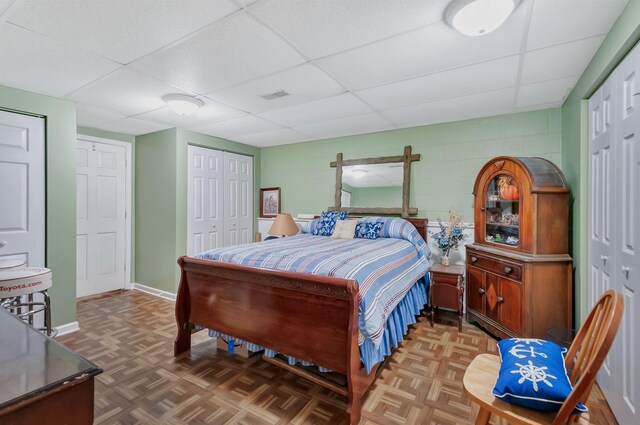 20151 Ben Fly Rd, Lyles, TN 37098 - bedroom with a drop ceiling, concrete block wall, and a closet