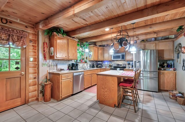 20151 Ben Fly Rd, Lyles, TN 37098 - kitchen featuring stainless steel appliances, backsplash, a wooden ceiling with exposed beams, light countertops, and light tile patterned floors