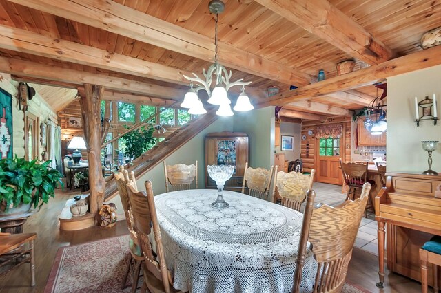 20151 Ben Fly Rd, Lyles, TN 37098 - dining area featuring a wooden ceiling with exposed beams, a chandelier, wood finished floors, and stairway