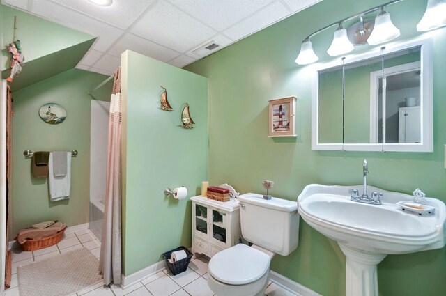 20151 Ben Fly Rd, Lyles, TN 37098 - bathroom with tile patterned flooring, a drop ceiling, and shower / bath combination with curtain