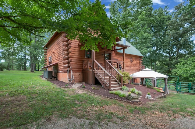 20151 Ben Fly Rd, Lyles, TN 37098 - view of side of property featuring log exterior, stairs, and a gazebo