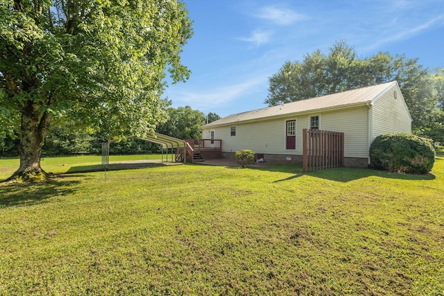 4628 Dugger Rd, Culleoka, TN 38451 - view of grassy yard with a detached carport and a wooden deck