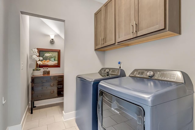 607 Beamon Dr, Franklin, TN 37064 - laundry room with cabinet space, separate washer and dryer, and light tile patterned floors