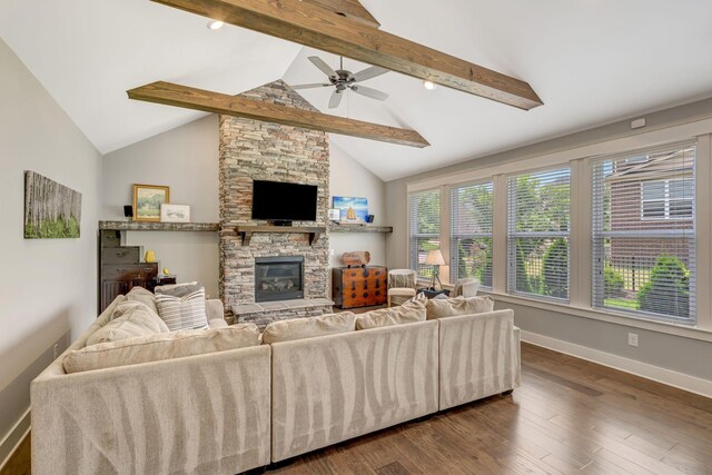 607 Beamon Dr, Franklin, TN 37064 - living room featuring a stone fireplace, a ceiling fan, and dark wood-type flooring