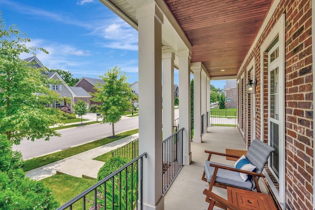 607 Beamon Dr, Franklin, TN 37064 - covered porch with a residential view