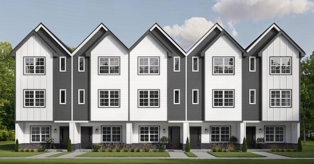 700 N Dupont Ave Unit 207, Madison, TN 37115 - townhome / multi-family property with board and batten siding and a front yard