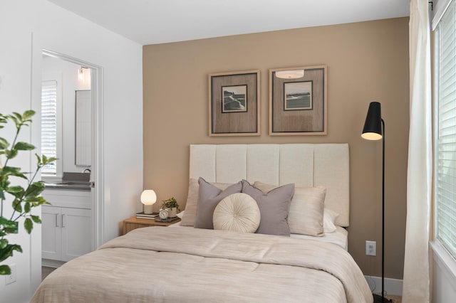 700 N Dupont Ave Unit 207, Madison, TN 37115 - bedroom with connected bathroom
