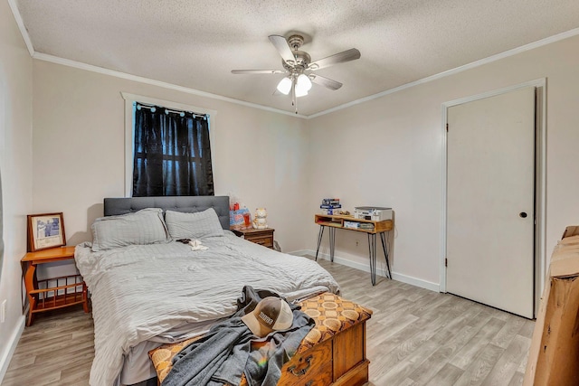 111 School St, Cumberland Furnace, TN 37051 - bedroom with light wood-style floors, ornamental molding, a textured ceiling, and ceiling fan